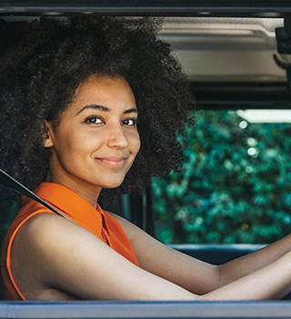 A woman driving a car