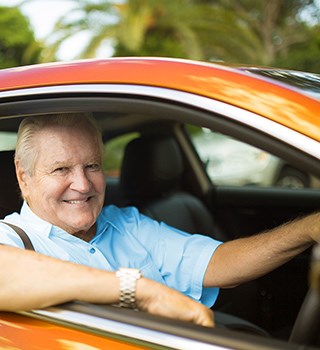 A man driving a car